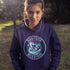 Featuring a stunning graphic of a majestic snowy owl in flight, set against the glowing northern lights, this hoodie embodies the freedom and grace of the province’s untamed wilderness.